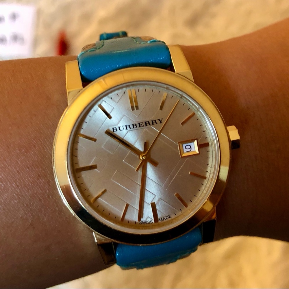 **SOLD**Burberry gold and blue watch